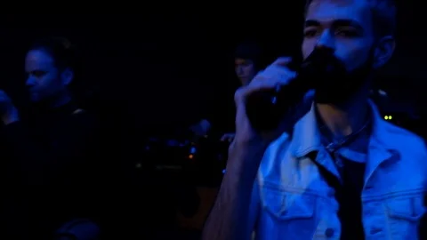 Handheld close-up shot of a man dancing in the club Stock-Footage 114886133