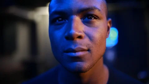 Handheld close-up shot of a man dancing in the nightclub Stock Footage