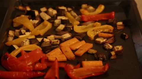 Handheld close-up shot of roasted vegetables Stock Footage 114846700
