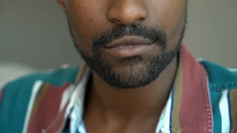Handheld close-up shot of smiling young man with beard 스톡 동영상 114866584