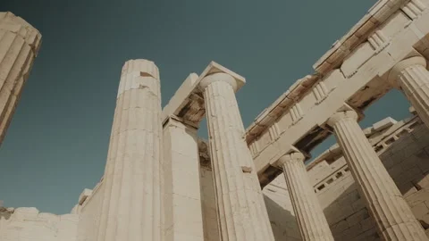 Handheld Close-Up of Sunlit Ancient Columns at Acropolis of Athens, Greece Stock Footage 342062949