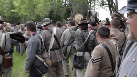 Handheld "Combat Camera" in a Confederate Firing line - Civil War Reenactment Stock Footage 148378183