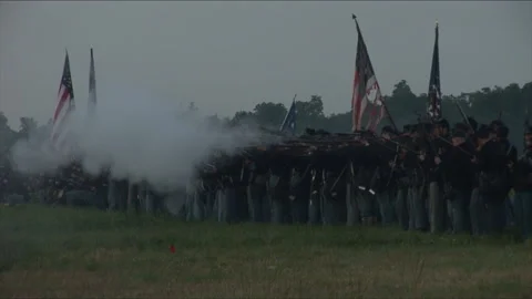 Handheld "Combat Camera" on a smoky Union Firing line - Civil War Reenactment Stock Footage 180273610