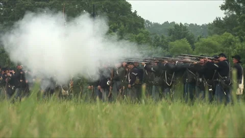 Handheld "Combat Camera" with the Union Firing Muskets - Civil War Reenactment Stock Footage 184272640