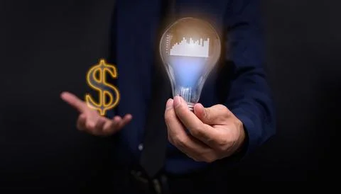 Handheld concept light bulb bar graph idea stock investment Stock Photos
