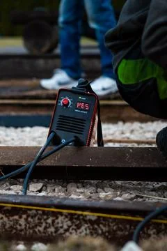Handheld current meter on railway line during daylight maintenance Stock Photos