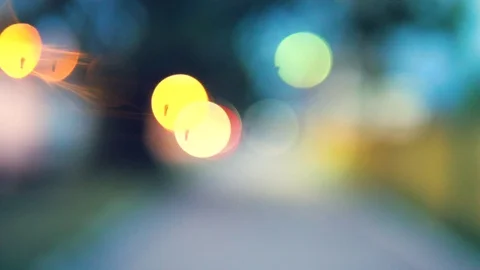 Handheld: Evening blur, car headlights, stabilized Stock Footage 90652298
