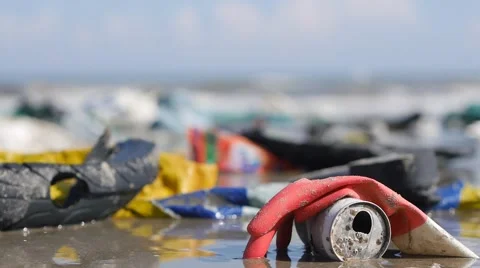 Handheld extreme close up of plastic garbage and trash on beach Stock-Footage 50787384