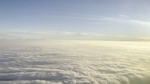 Handheld Flying above Clouds Sunset 4K HDR Stock Footage 250370480