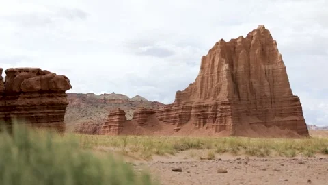Handheld Ground Level View of Temple of the Sun Rock Formation in Capitol Reef N Stock Footage 340478340