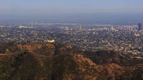 Handheld Hilltop Pan from Griffith Observatory to Downtown Los Angeles Stock Footage 76546936