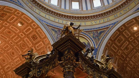 Handheld Low-Angle Pan of St. Peter’s Basilica Golden Baldachin with Blurred Dom Stock Footage 315761594
