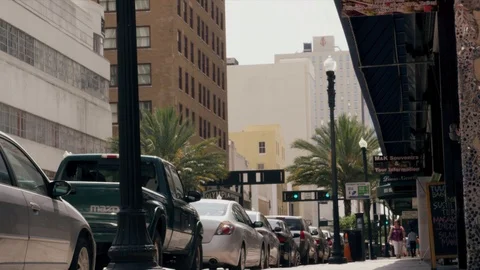 Handheld Low Angle Shot Downtown City Sidewalk - Filmed Red Scarlet 4k Video stock 86411447