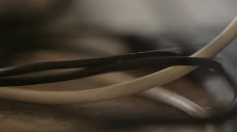 Handheld Macro Rack Focus of Tangled Cables and USB 動画素材 68723642