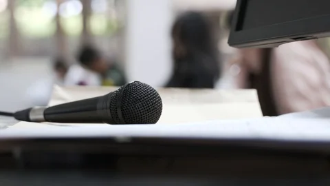 Handheld microphone at lecture room Stock Footage 119697089