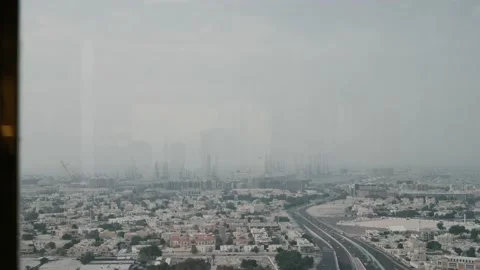 Handheld, middle eastern, view of cityscape on the horizon, the modern Arab Stock Footage 218813510