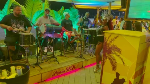 Handheld Night Samba Band Performs at Praia Skol Copacabana Stock Footage 334826708
