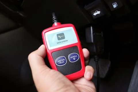 Handheld OBD2 scanner diagnostic tool Stock Photos
