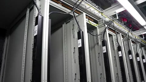 Handheld Pan Across Empty Server Cabinets in Modern Data Center with Ceilin.. Video stock 341694464