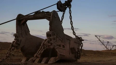 Handheld PAN shot of dragline excavator bucket 15 cubic meters with massive Stock Footage 75528057