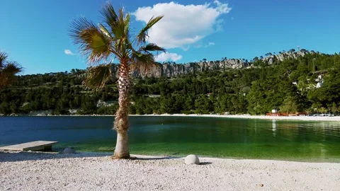 Handheld panning shot of Kasjuni beach in Split, Dalmatia region in Stock Footage 168243597