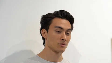 Handheld portrait of handsome man at store 스톡 동영상 114849623