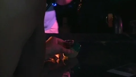 Handheld: Pouring Shots at a Bar Stock Footage 79585049