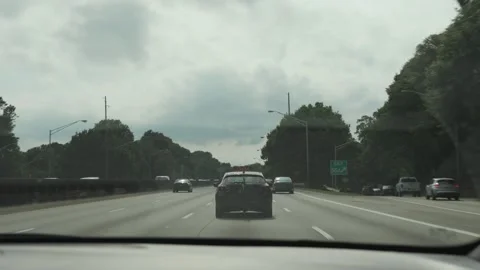 Handheld POV from moving vehicle on Interstate 75 in Atlanta, Georgia Stock Footage 241698274