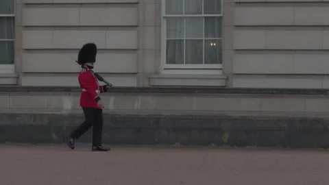 Handheld, Royal Guard Marching Alongside Historic Palace During Ceremony Stock-Footage 341096314