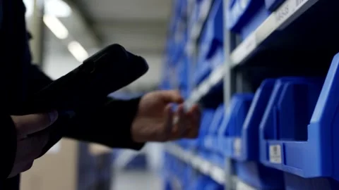 Handheld Scanner at Blue Storage Bins, Warehouse Order Picking, Close Up Shot Видео 341434245