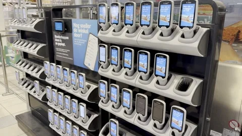 Handheld scanners are charging in a store Stock Footage 305152604