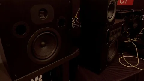 Handheld Shot of Audio Speakers on Table Stock Footage 104884891