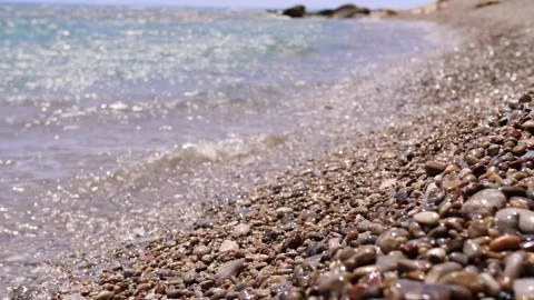Handheld Shot of Blue Waves on Stone Beach Rhodes Island Stock Footage 158118666