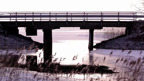Handheld shot of a bridge over a strait Stock Footage 70174191