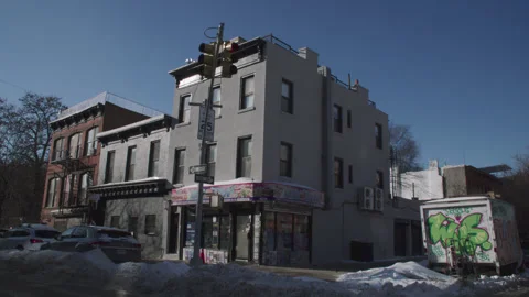 Handheld shot of a Brooklyn corner store Stock Footage 328337590