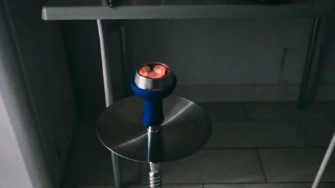 Handheld shot of burning coal in hookah pot Stock Footage 122518278
