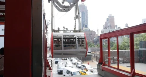 Handheld shot of cable railway wagon arrives at platform Stock Footage 120147785