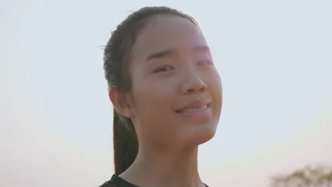 Handheld shot, Close up portrait, young woman in sportswear turn her face  Stock-Footage 200362336