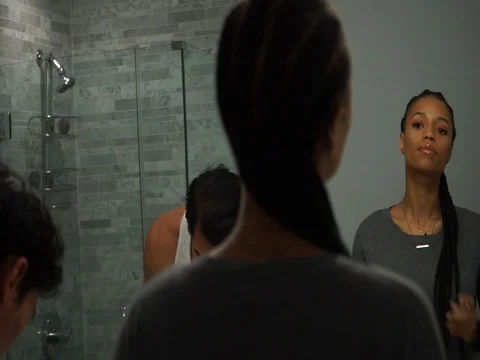 Handheld shot of couple getting ready in bathroom Video stock 114878717