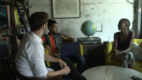 Handheld shot of creative business executives working in team over new project Stock Footage 114855607
