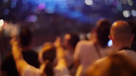 Handheld shot of a crowd making party at a rock concert 動画素材 52740799