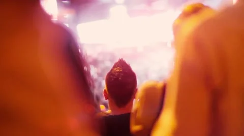Handheld shot of a crowd making party at a rock concert Video stock 52750883