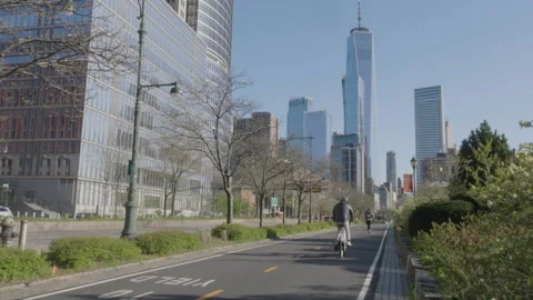 Handheld shot of cyclists on The West Side Highway Stock Footage 275323456