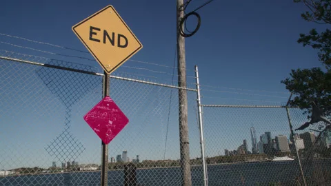 Handheld shot of a dead end sign in Brooklyn Stock Footage 321161542