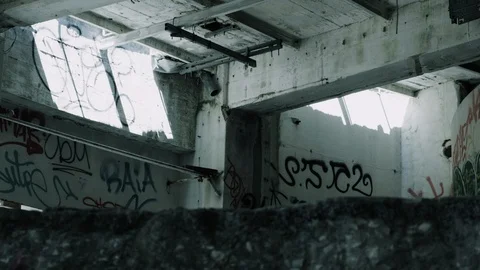 Handheld shot of destroyed ceiling in abandoned warehouse Stock Footage 112897208