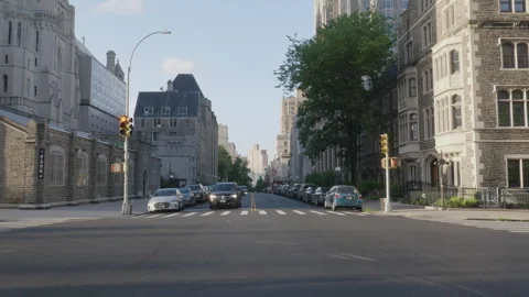 Handheld shot of an empty street in Manhattan's Morningside Heights. Stock Footage 280016967