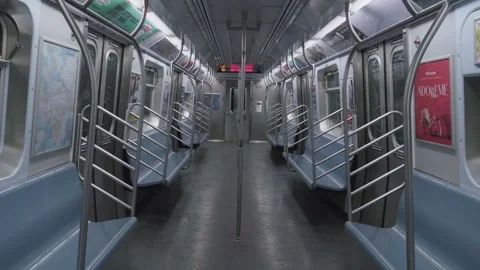 Handheld shot of an empty subway car Stock Footage 266211614