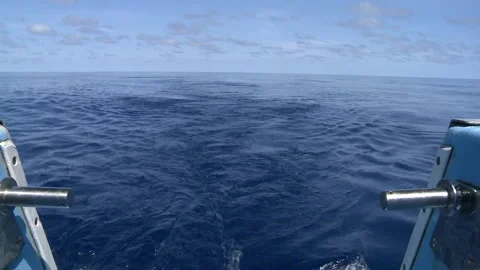 Handheld shot of the engine of a boat creating waves Stock Footage 310539863