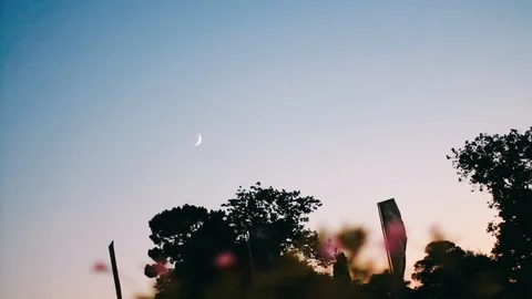 Handheld shot of flag fluttering in the wind against sky Stock Footage 122519276