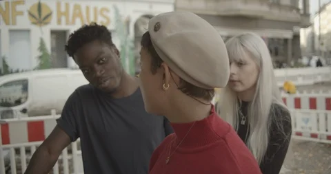 Handheld shot of friends talking Stock Footage 120423643